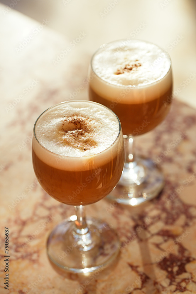 coffee latte in tall glasses with morning sun in summer cafe bac coffee latte in tall glasses with morning sun in summer cafe bac