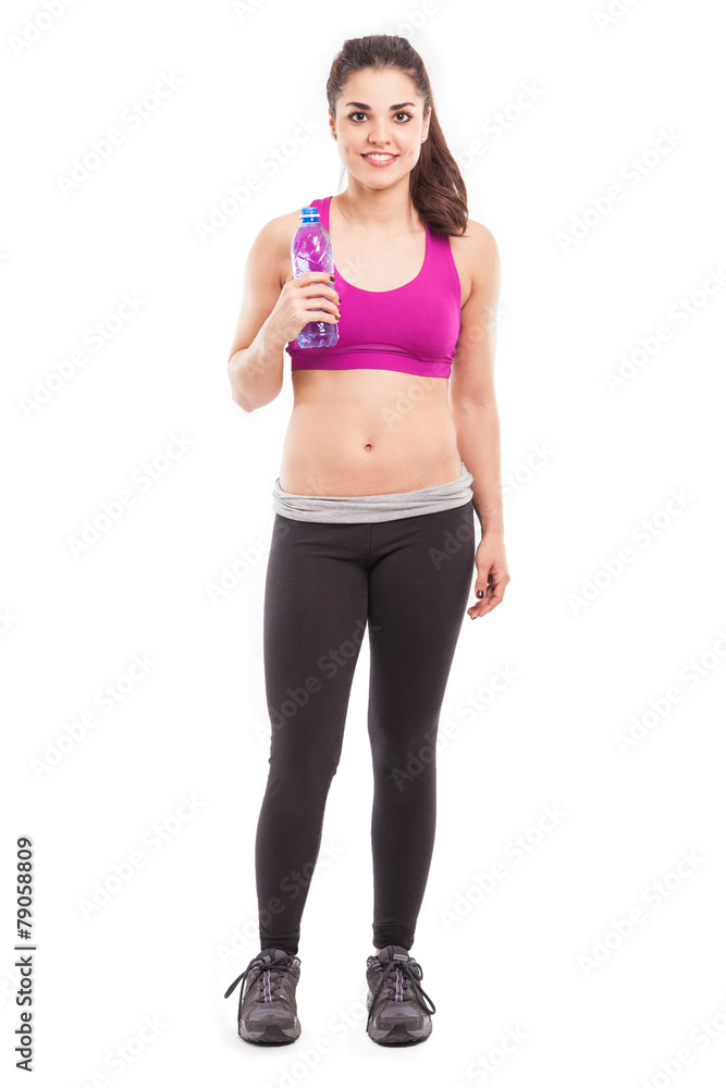 Athletic woman drinking water Athletic woman drinking water