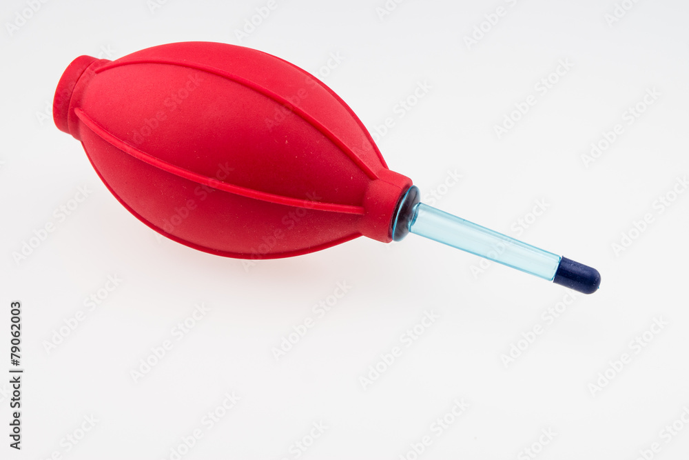 red rubber air blower pump dust cleaner isolated on white backgr red rubber air blower pump dust cleaner isolated on white backgr