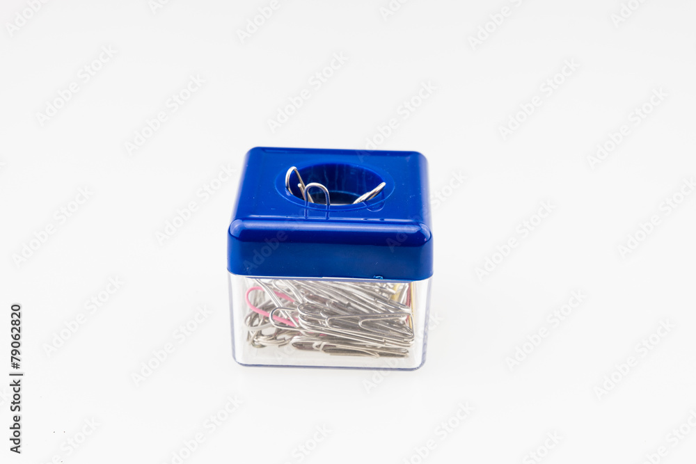 Paper clip box with on top a magnet to hold some paper clips Paper clip box with on top a magnet to hold some paper clips