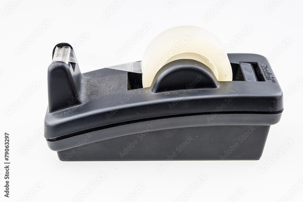 A scotch tape isolated against a white background A scotch tape isolated against a white background