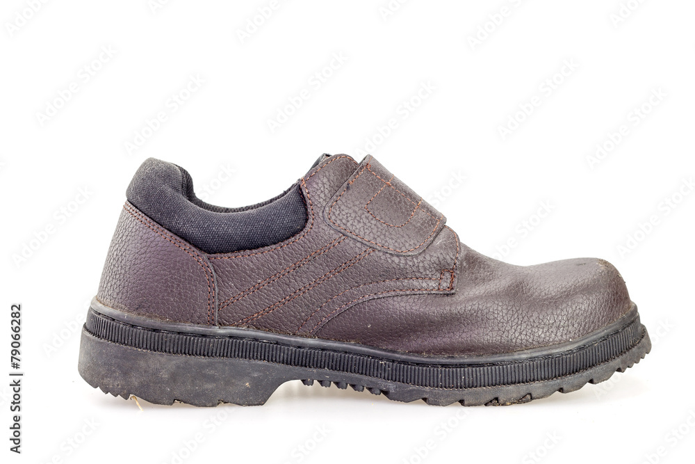 Old black safety shoe for worker Old black safety shoe for worker