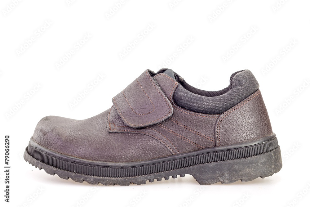 Old black safety shoe for worker Old black safety shoe for worker
