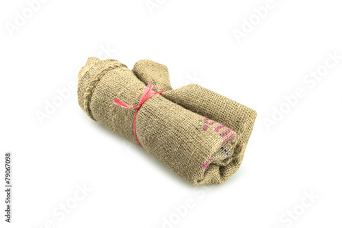 Roll of old sack or crumpled burlap