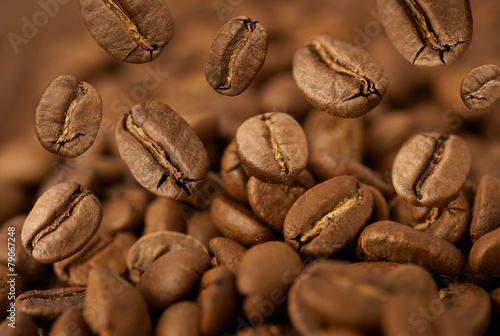 Closeup of coffee beans with focus on one © Natalia Merzlyakova