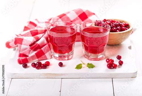 glasses of cranberry juice with fresh berries