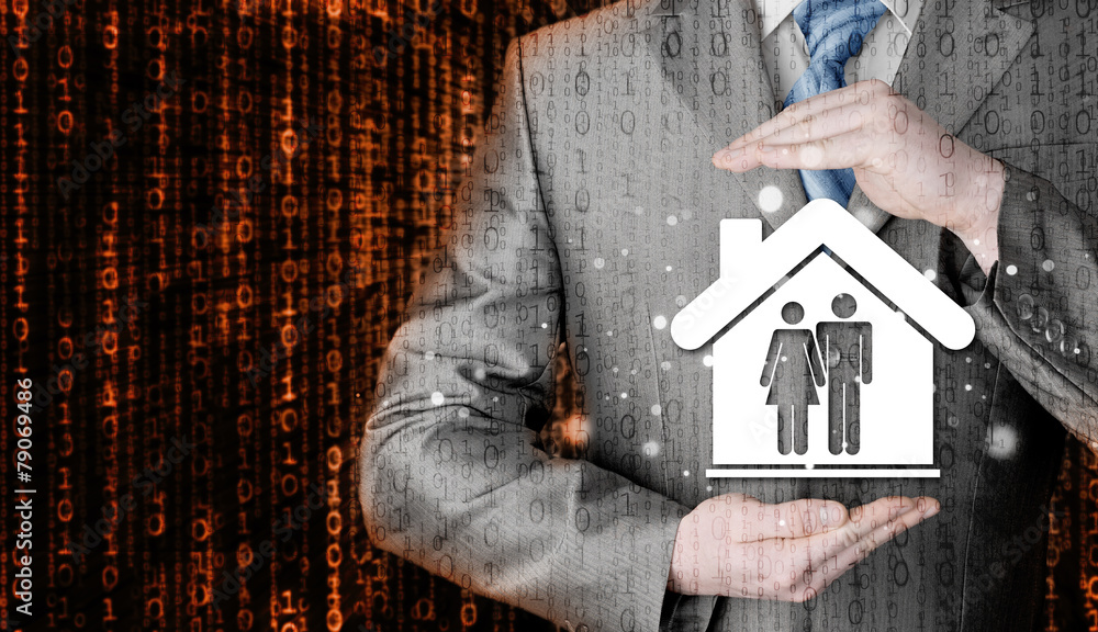 businessman protecting family in home with hands businessman protecting family in home with hands