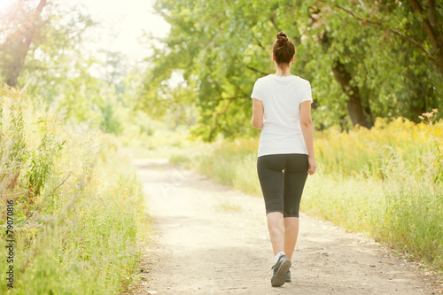 Runner woman jogging outdoors