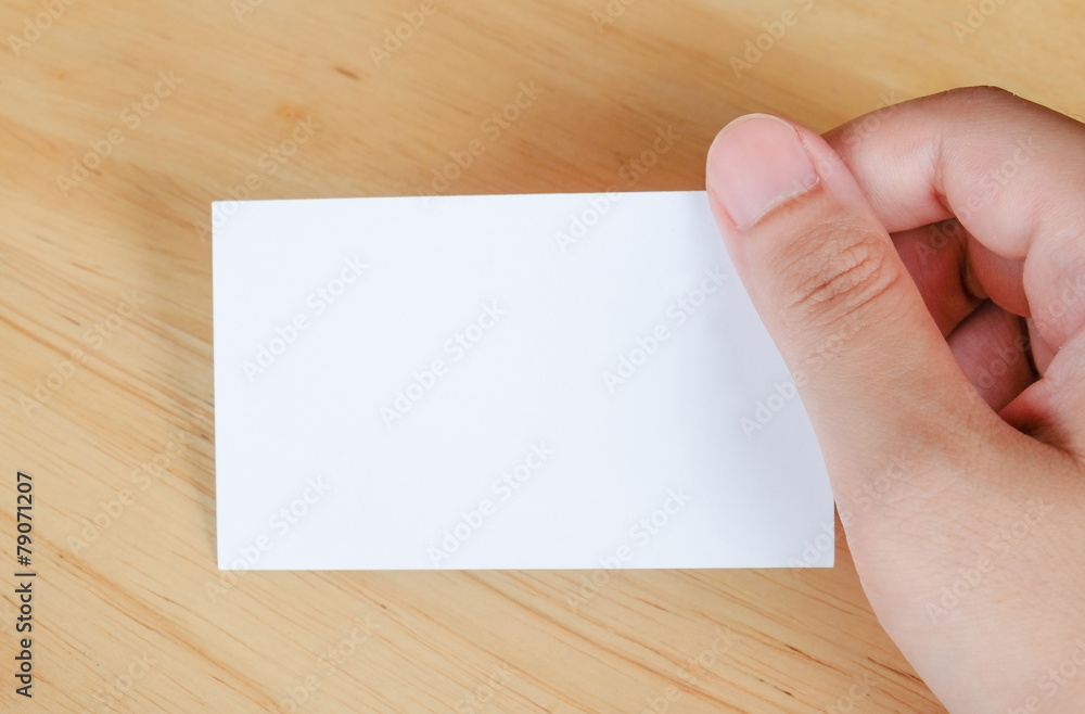 Name card in hand, business background Name card in hand, business background