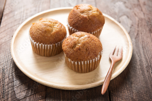 muffins on a wooden table