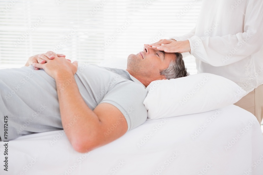 Therapist working with man