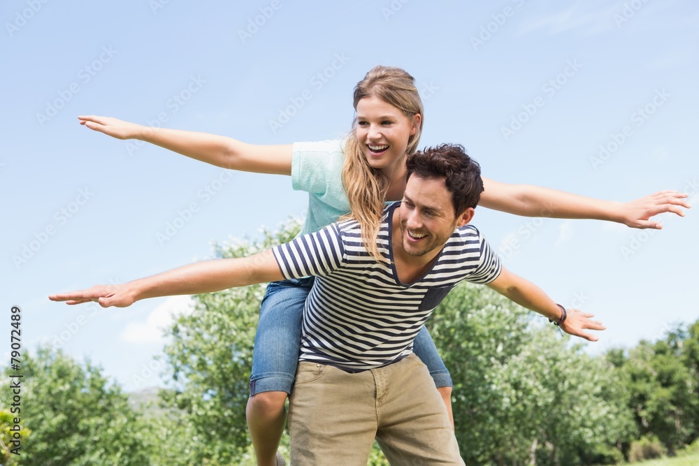 Cute couple having fun in park
