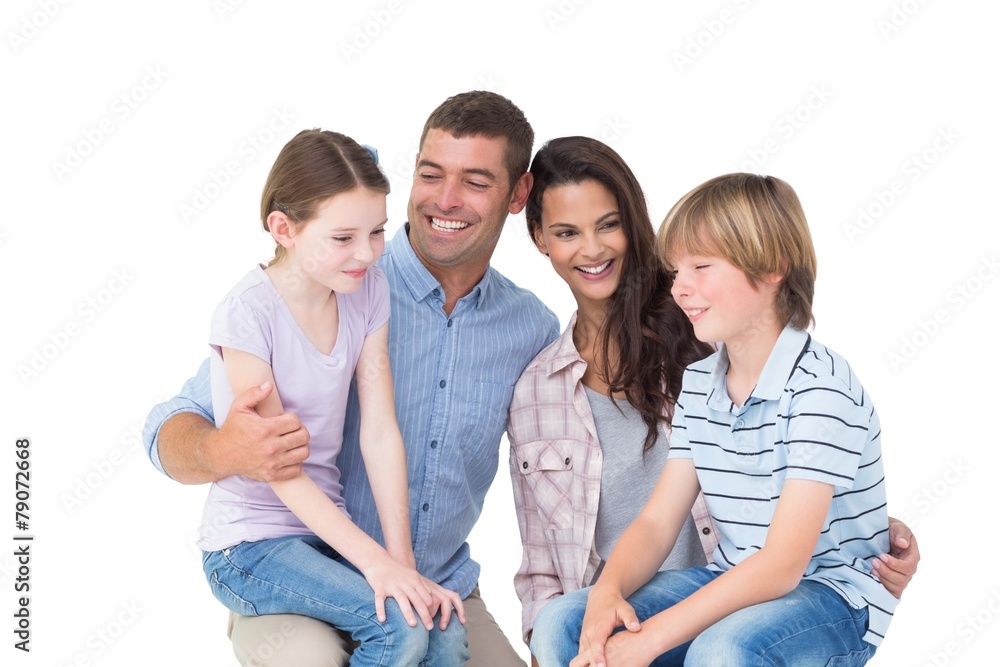 Children sitting on parents laps over white background Children sitting on parents laps over white background