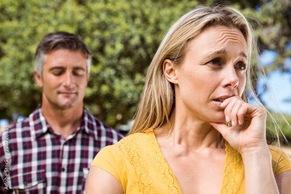 Fototapeta premium Couple having an argument in the park