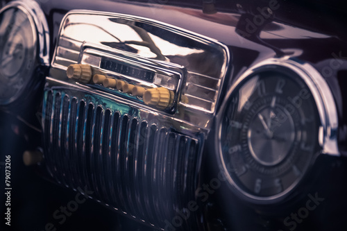Old radio in retro car interior