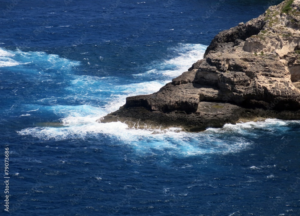 high cliff on the sea with waves high cliff on the sea with waves