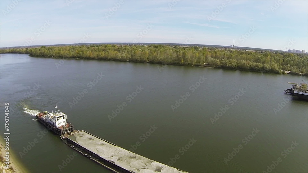 River tow on beautiful river. Flight by panorama. Aerial. River tow on beautiful river. Flight by panorama. Aerial.