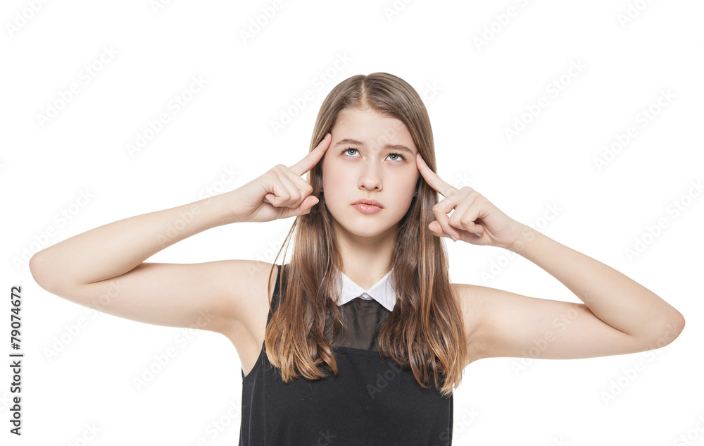 Young teenage girl pressed her fingers to the temple isolated Young teenage girl pressed her fingers to the temple isolated
