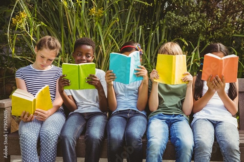 Fotografia Children reading books at park
