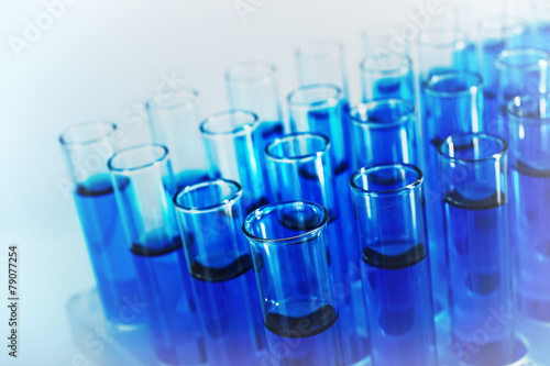 Test-tubes with blue fluid, close-up