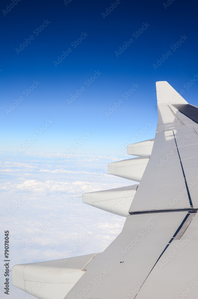 Obraz premium Aerial view of sky from aircraft window