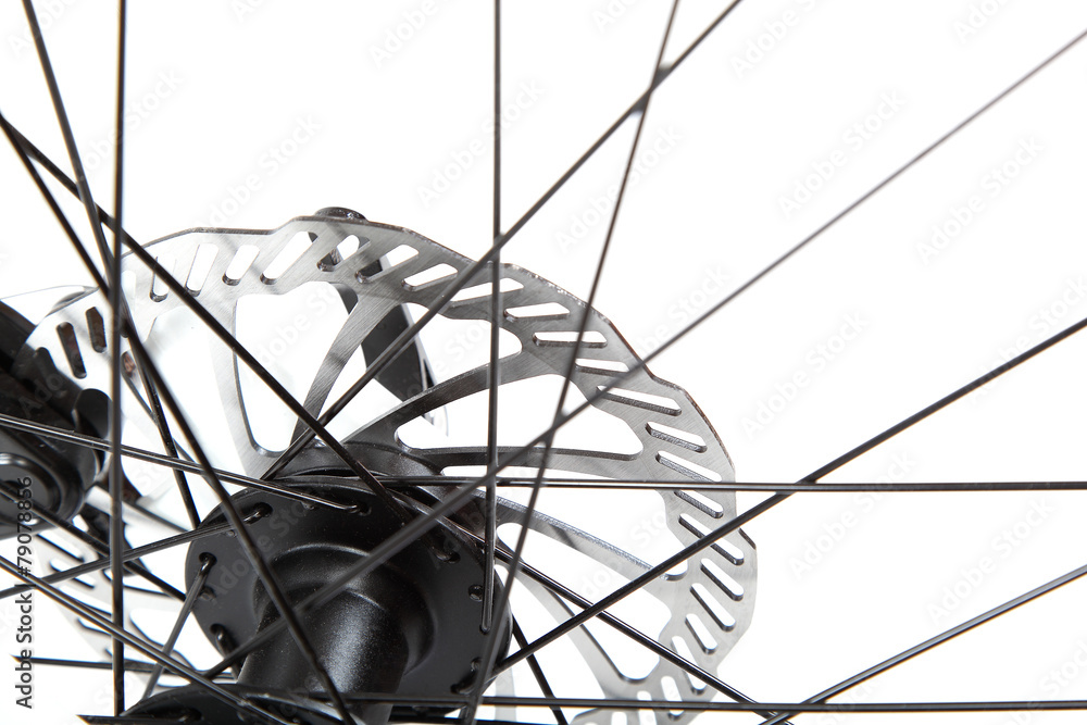 Obraz premium Bicycle wheel with spokes on a white background.