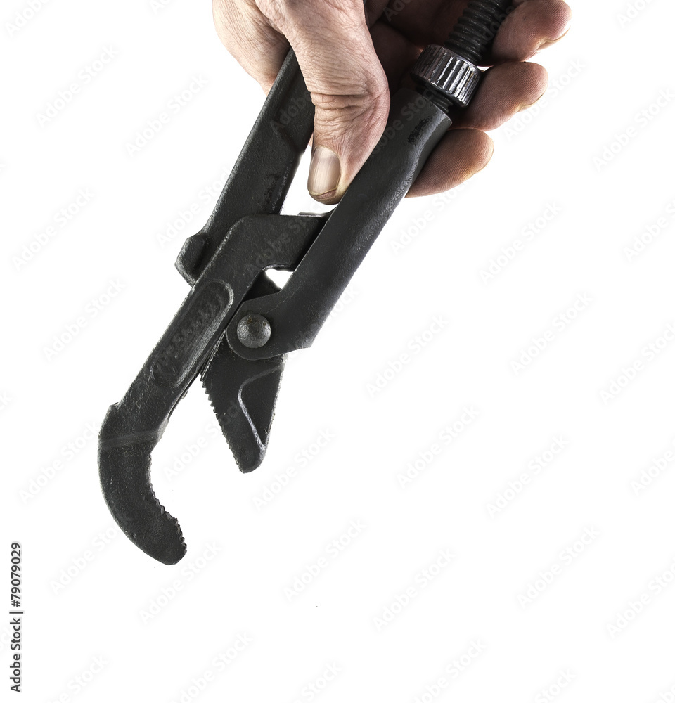 Obraz premium hand holding a wrench isolated on white background