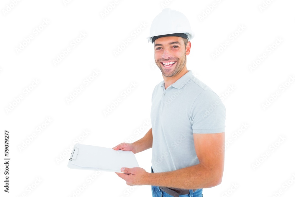 Portrait of manual worker holding clipboard Portrait of manual worker holding clipboard