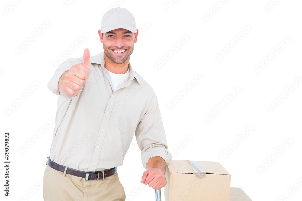 Delivery man gesturing thumbs up on white background Delivery man gesturing thumbs up on white background