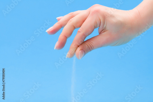 Hand sprinkling salt