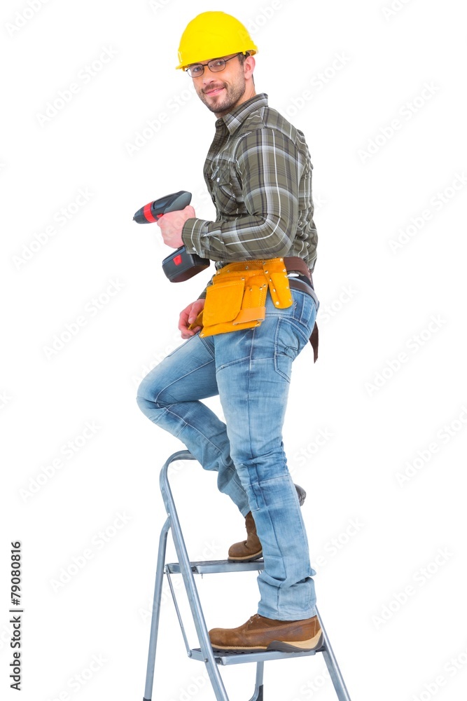 Repairman with drill machine climbing ladder Repairman with drill machine climbing ladder