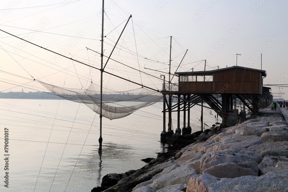 Stilt House overlooking the sea and fishing nets of fishermen