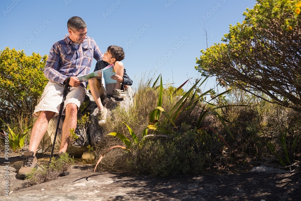 Father and son hiking in the mountains Father and son hiking in the mountains