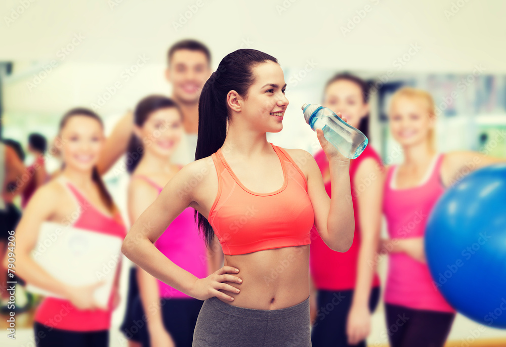 Fototapeta premium sporty woman with water bottle