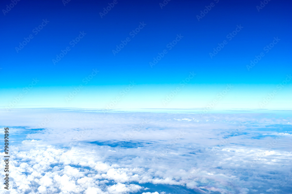 Cloudy blue sky from aircraft view