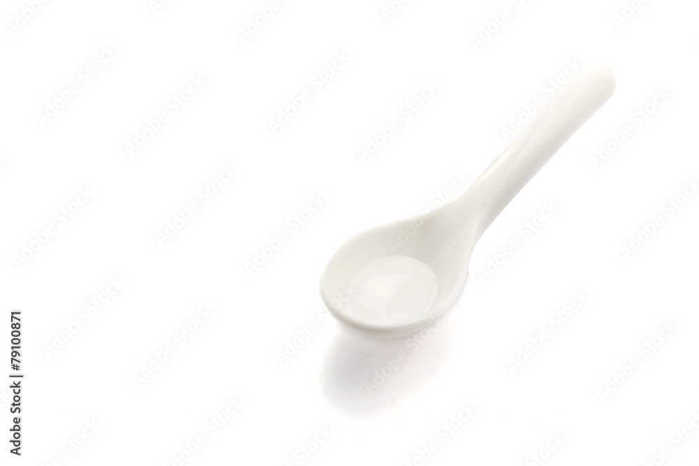 Plastic spoon isolated on white background. Plastic spoon isolated on white background.