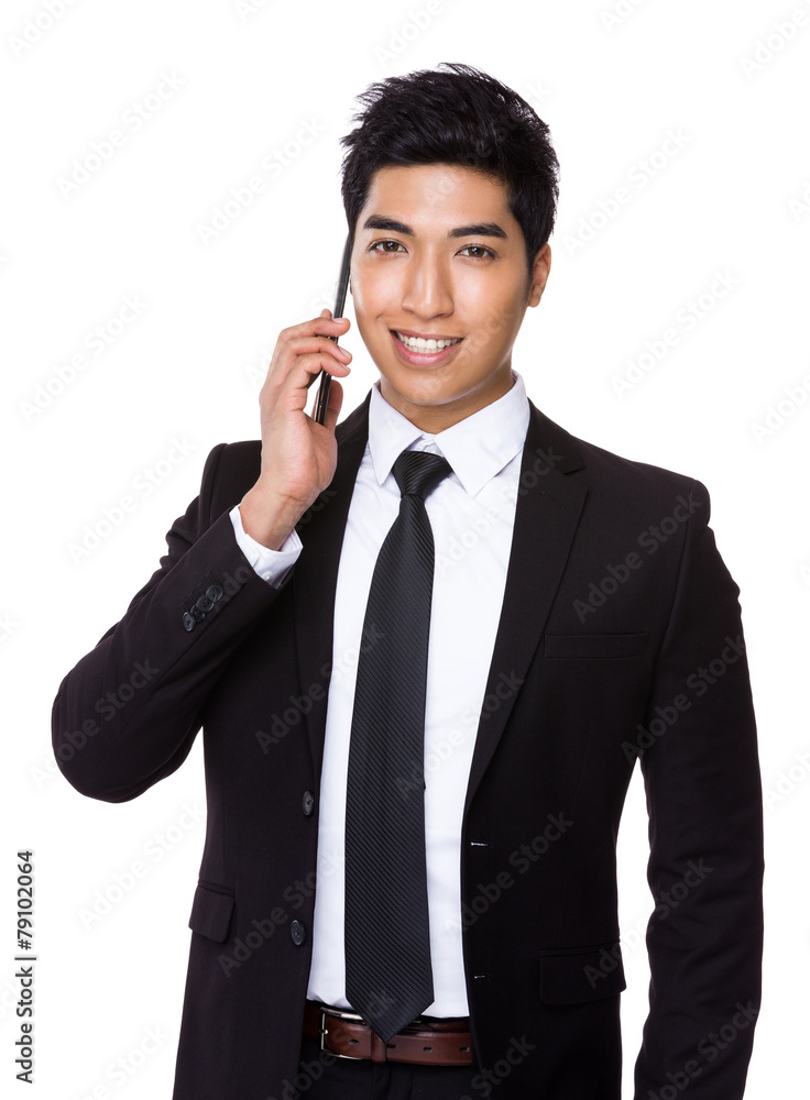 Mixed Indian businessman talk to mobile phone Mixed Indian businessman talk to mobile phone