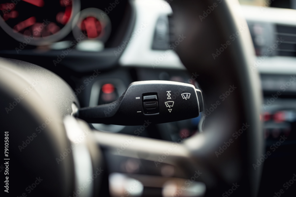 Close-up of car wipers control - modern car interior details Close-up of car wipers control - modern car interior details