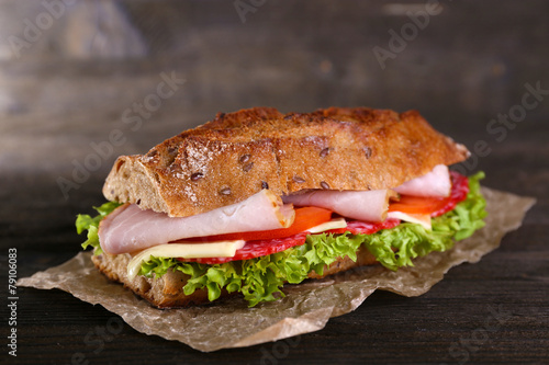Fresh and tasty sandwich with ham and vegetables