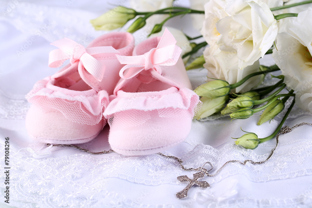 Baby shoe, flowers and cross for Christening Baby shoe, flowers and cross for Christening