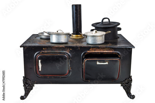 Retro doll house cooking stove isolated on white photo