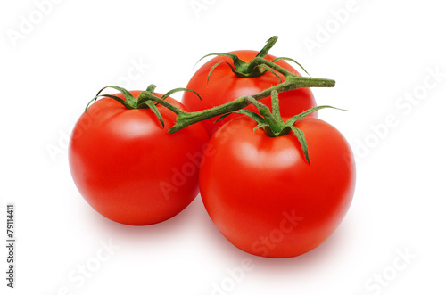 Three fresh red tomatoes on isolated backround