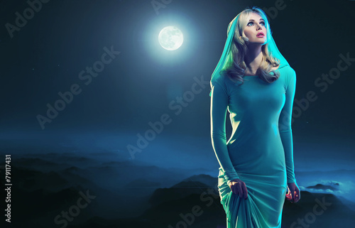Portrait of an young woman over the moon