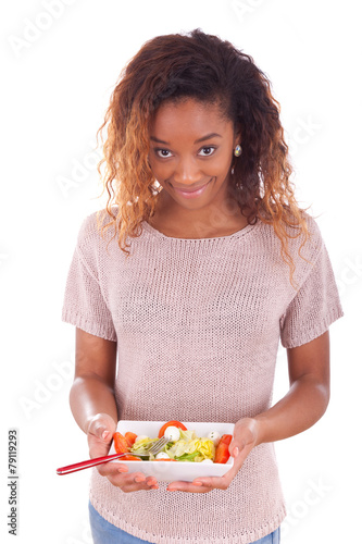 African American woman eating salad  isolated on white backgroun