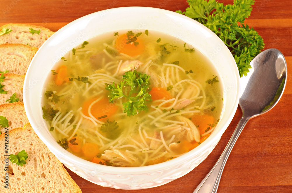 Bowl with chicken soup with vegetables and chicken meat Bowl with chicken soup with vegetables and chicken meat