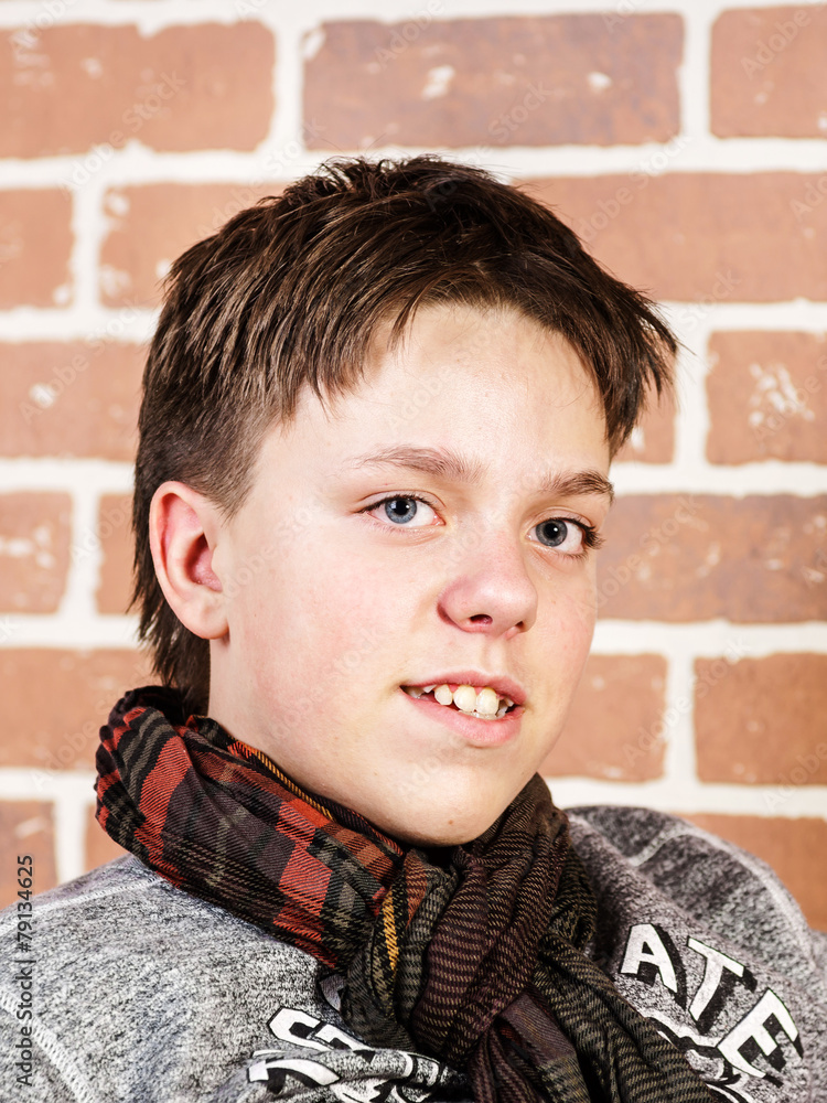 Affective teenage boy portrait in studio Affective teenage boy portrait in studio