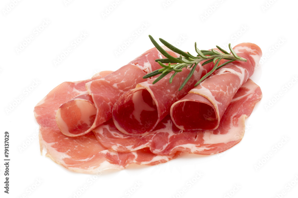 Dried pig meat slices. Delicatess. Dried pig meat slices. Delicatess.