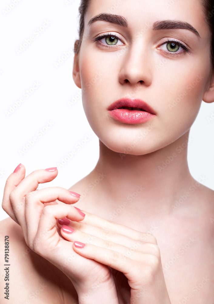 Young beautiful woman with day makeup and green pistachio colou Young beautiful woman with day makeup and green pistachio colou