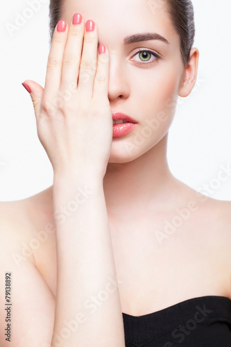 Young beautiful woman with day makeup and  green pistachio colou photo