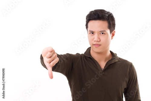 man giving thumb down, showing rejection photo